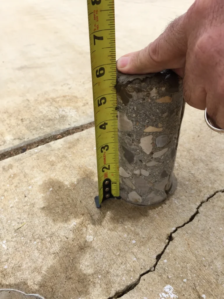 Forensic engineering expert witness concrete core sample measurement during infrastructure failure investigation